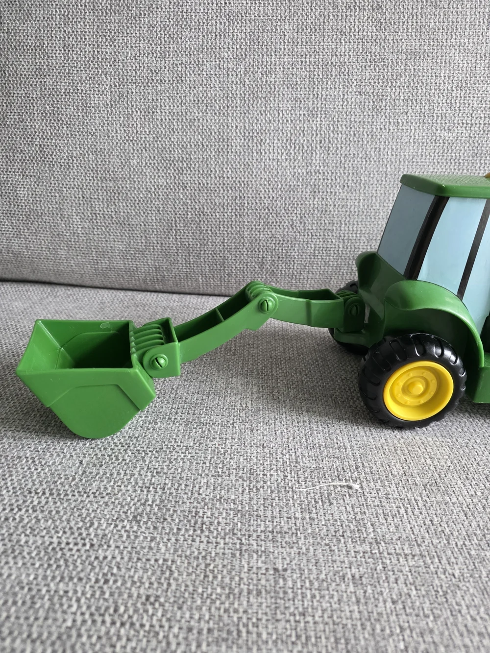 John Deere Green Smiling Excavator Toy with Black Wheels